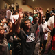 Residents of Ferguson, Mo., shout as the City Council and mayor leave the altar at the Greater Grace Church after the Ferguson City Council meeting on Sept. 9, 2014. The meeting was held at the church to accommodate the large crowd.
Scott Olson/Getty Images